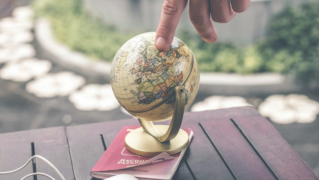 small globe on table international human resource management